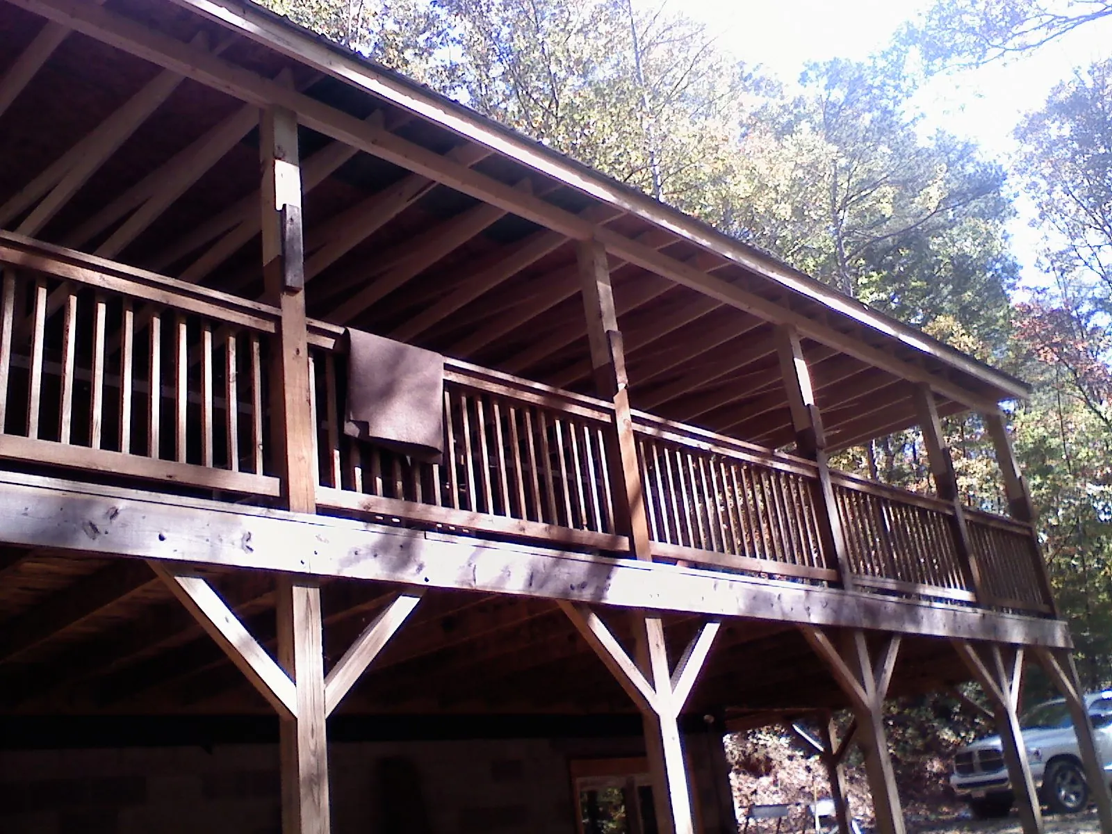 Timber framing under a new elevated porch and deck — Roof Leak Repair in Agness by Roofing Brothers